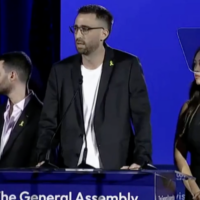 Released hostage Avinatan Or speaks at the Jewish Federations of North America General Assembly, November 16, 2025. (Screenshot)